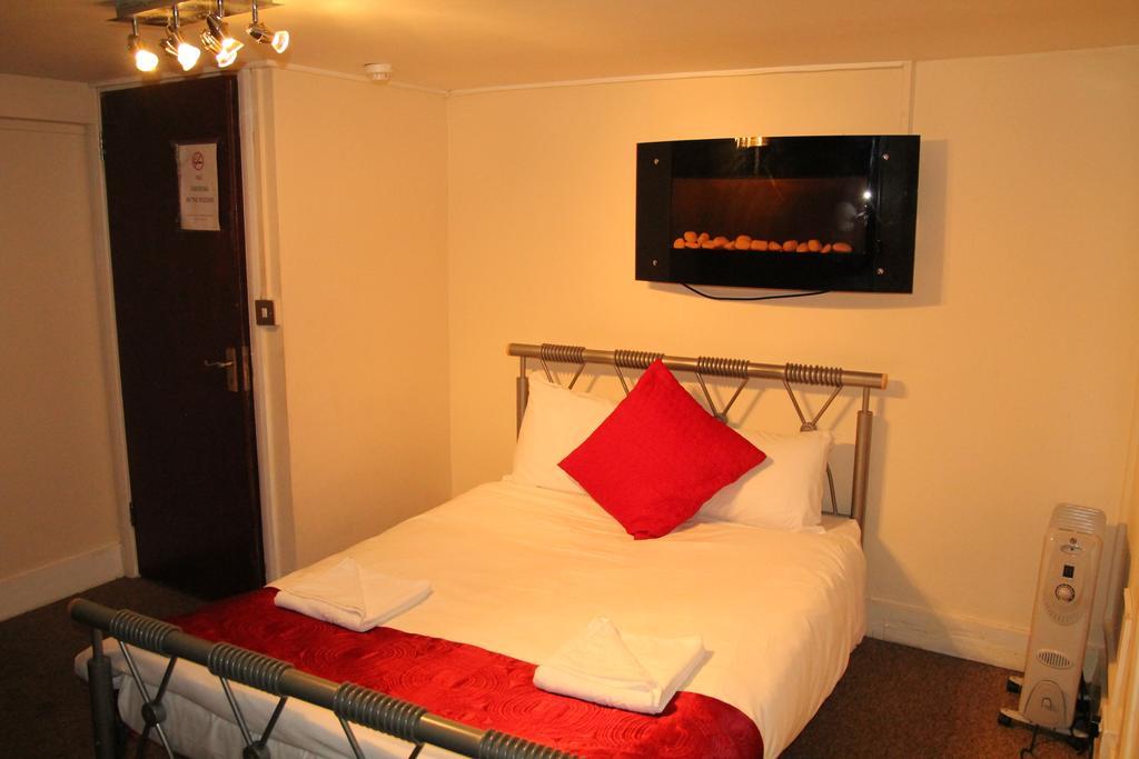London Olympus Hotel Nirvana Phòng bức ảnh