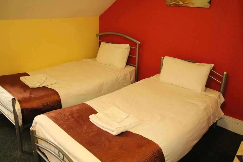 London Olympus Hotel Nirvana Phòng bức ảnh